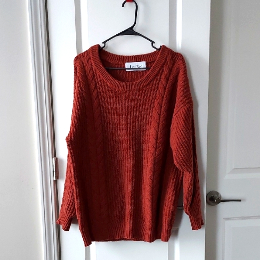 Liny Xin rust cable knit sweater